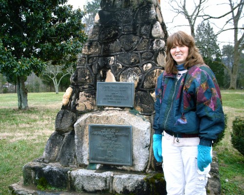 Marnie Pehrson Kuhns in front of Dicey Monument. Center stone was the hearthstone of Dicey's Home in Traveler's Rest, SC